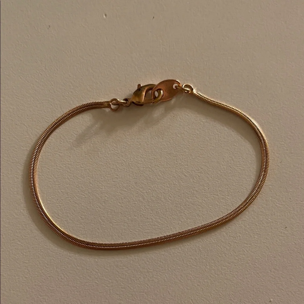 S. H gold tone metal bracelet - Picture 1 of 3